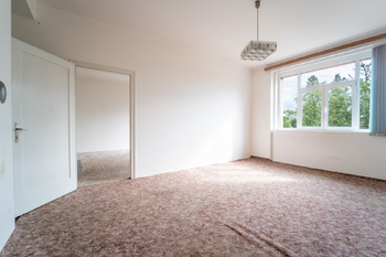 Obývací pokoj - Prodej bytu 2+1 v osobním vlastnictví 68 m², Poděbrady