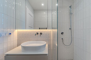 Koupelna - Prodej bytu 3+1 v osobním vlastnictví 84 m², Slaný