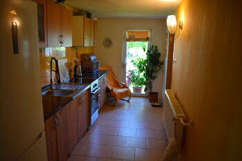 Kuchyň s francouzským oknem - Prodej domu 200 m², Velká Kraš