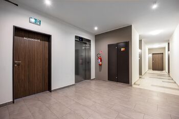 Hala / Chodba - Prodej bytu 1+kk v družstevním vlastnictví 54 m², Praha 10 - Dolní Měcholupy