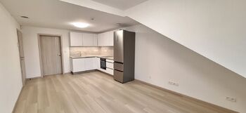 Obývací pokoj s kuchyňským koutem  - Pronájem bytu 4+kk v osobním vlastnictví 72 m², Bučovice 