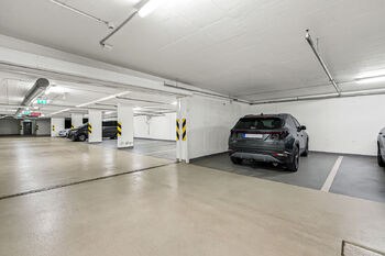 Garážová stání - Prodej bytu 4+kk v osobním vlastnictví 104 m², Praha 8 - Karlín