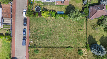 Prodej pozemku 719 m², Praha 10 - Dolní Měcholupy