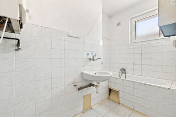 koupelna - Prodej bytu 3+1 v osobním vlastnictví 77 m², Teplice