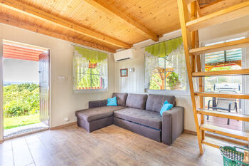 obývací část s klimatizací - Prodej chaty / chalupy 52 m², Chbany