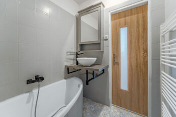 Koupelna - Prodej bytu 3+1 v osobním vlastnictví 77 m², Nížkovice