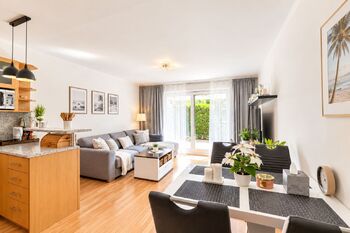 obývací pokoj s kuchyní - Prodej bytu 2+kk v osobním vlastnictví 58 m², Dolní Břežany 