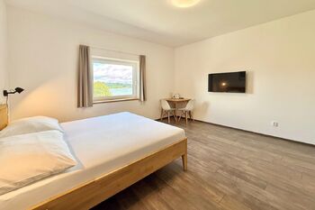 Prodej bytu 1+kk v osobním vlastnictví 28 m², Černá v Pošumaví