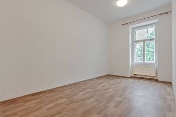 Obývací pokoj - Prodej bytu 1+1 v osobním vlastnictví 31 m², Praha 6 - Dejvice