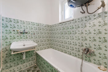 koupelna - Prodej bytu 3+kk v osobním vlastnictví 70 m², Praha 10 - Dubeč