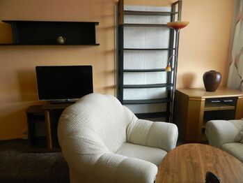 Obývací pokoj. - Prodej bytu 2+1 v osobním vlastnictví 64 m², Cheb