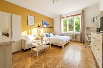 Obývací pokoj - Prodej bytu 1+1 v osobním vlastnictví 45 m², Praha 3 - Vinohrady