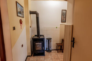 krbová kamna chodba 1.n.p. - Prodej domu 115 m², Děčín