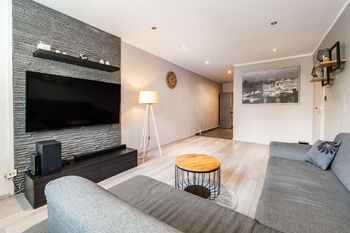 Obývací pokoj - Prodej bytu 3+kk v osobním vlastnictví 65 m², Praha 10 - Petrovice