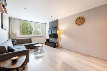 Obývací pokoj - Prodej bytu 3+kk v osobním vlastnictví 65 m², Praha 10 - Petrovice