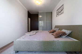 ložnice - Prodej bytu 2+kk v osobním vlastnictví 56 m², Brno