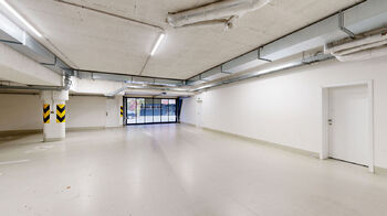 prostor garážových stání - Prodej bytu 3+kk v osobním vlastnictví 68 m², Praha 4 - Modřany