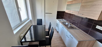 Kuchyně - Prodej bytu 2+1 v osobním vlastnictví 58 m², Rousínov