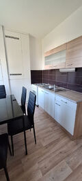 Kuchyně - Prodej bytu 2+1 v osobním vlastnictví 58 m², Rousínov