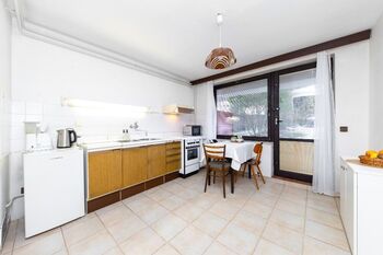 1NP Kuchyně - Prodej domu 298 m², Brno